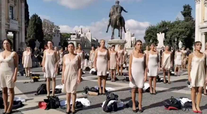 http___cdn-cnn_-com_cnnnext_dam_assets_211022095333-screengrab-alitalia-flight-attendant-protest-rome-10-20-2021